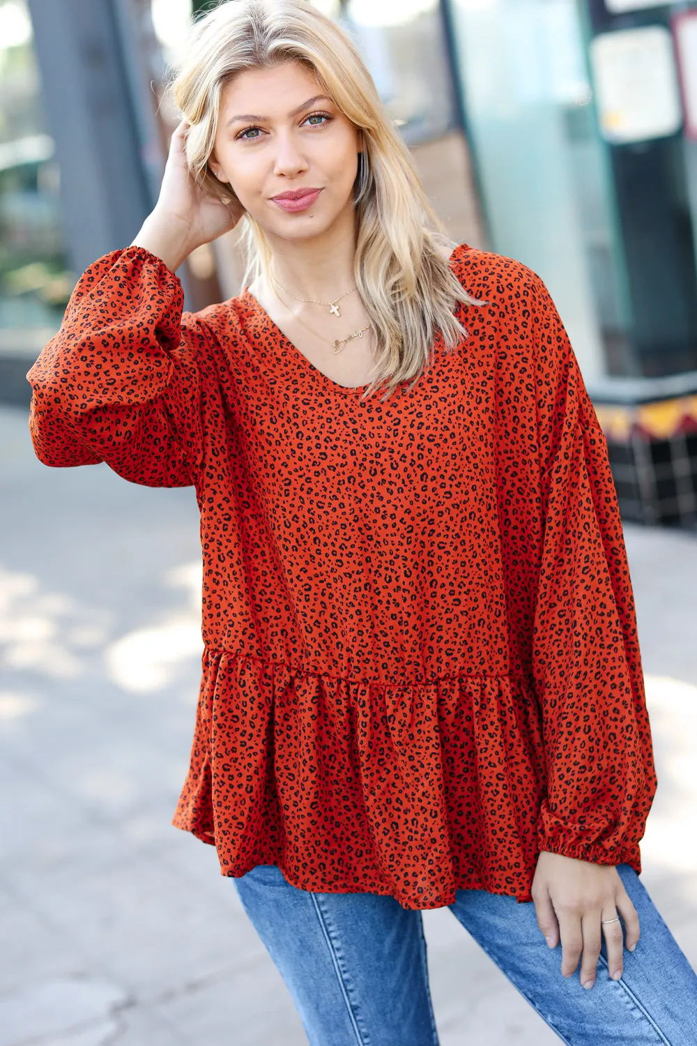 Feeling Bold Rust Leopard Print V Neck Peplum Top