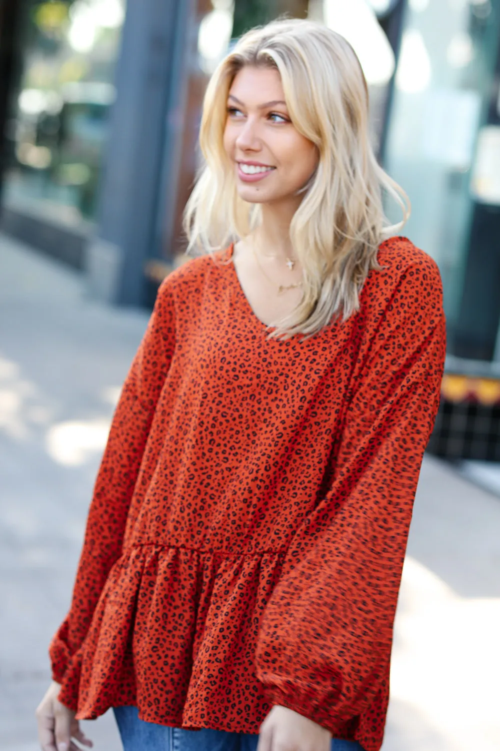 Feeling Bold Rust Leopard Print V Neck Peplum Top