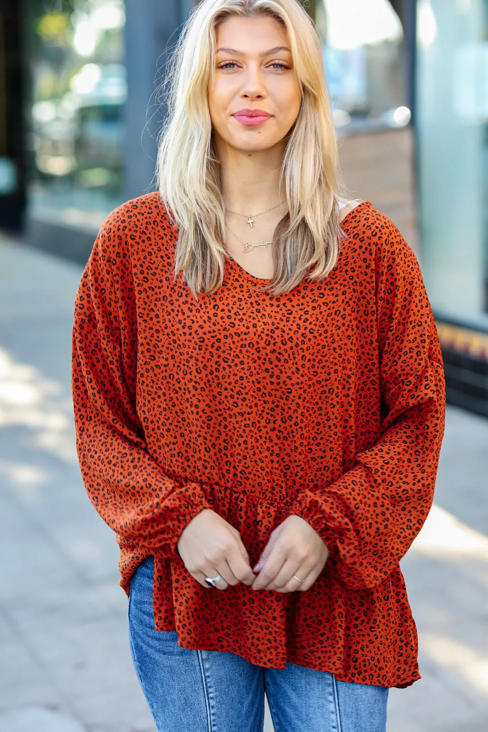 Feeling Bold Rust Leopard Print V Neck Peplum Top