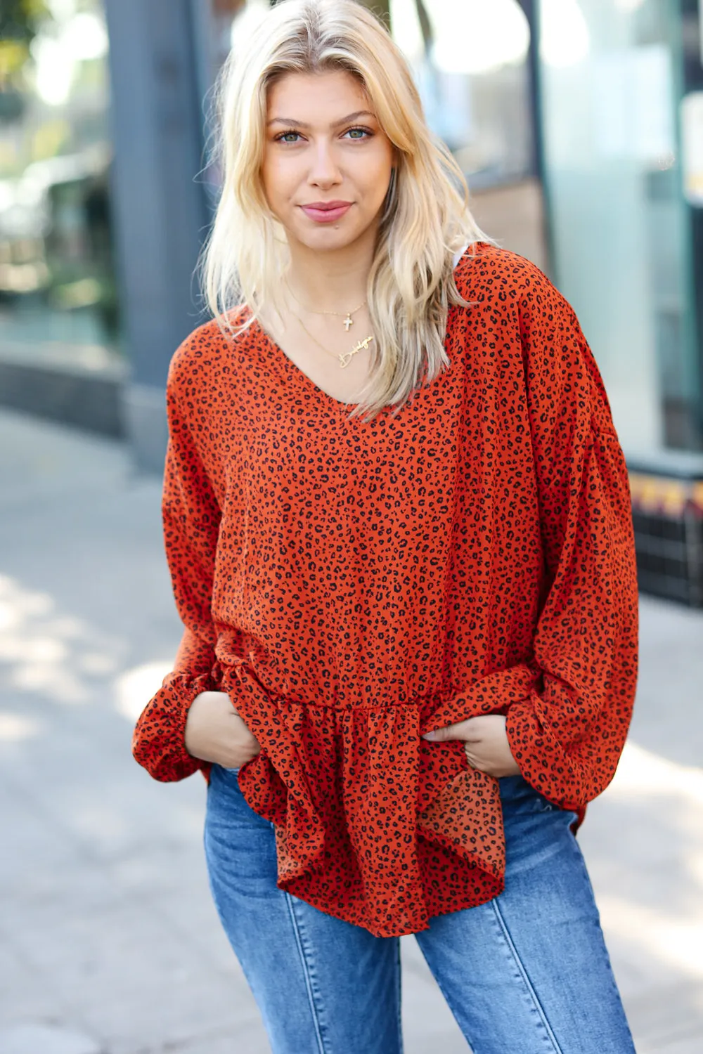 Feeling Bold Rust Leopard Print V Neck Peplum Top